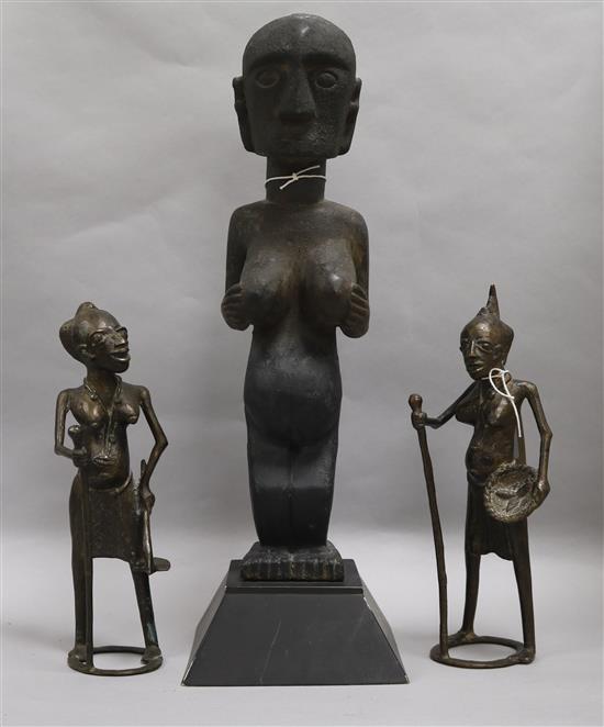 Two African bronze stylised female figures and a carved wood female fertility figure